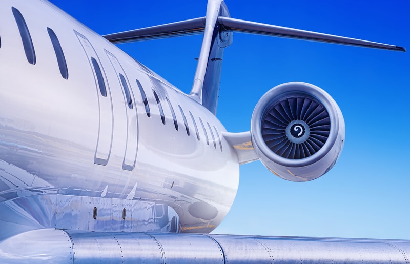 Private jet against a blue sky
